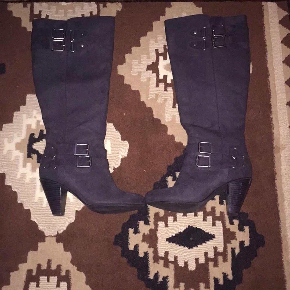 High heeled black boots